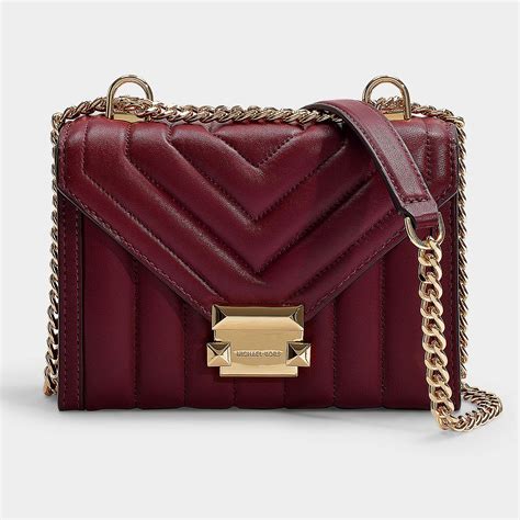 oxblood michael kors bag|Michael Kors trunk bag.